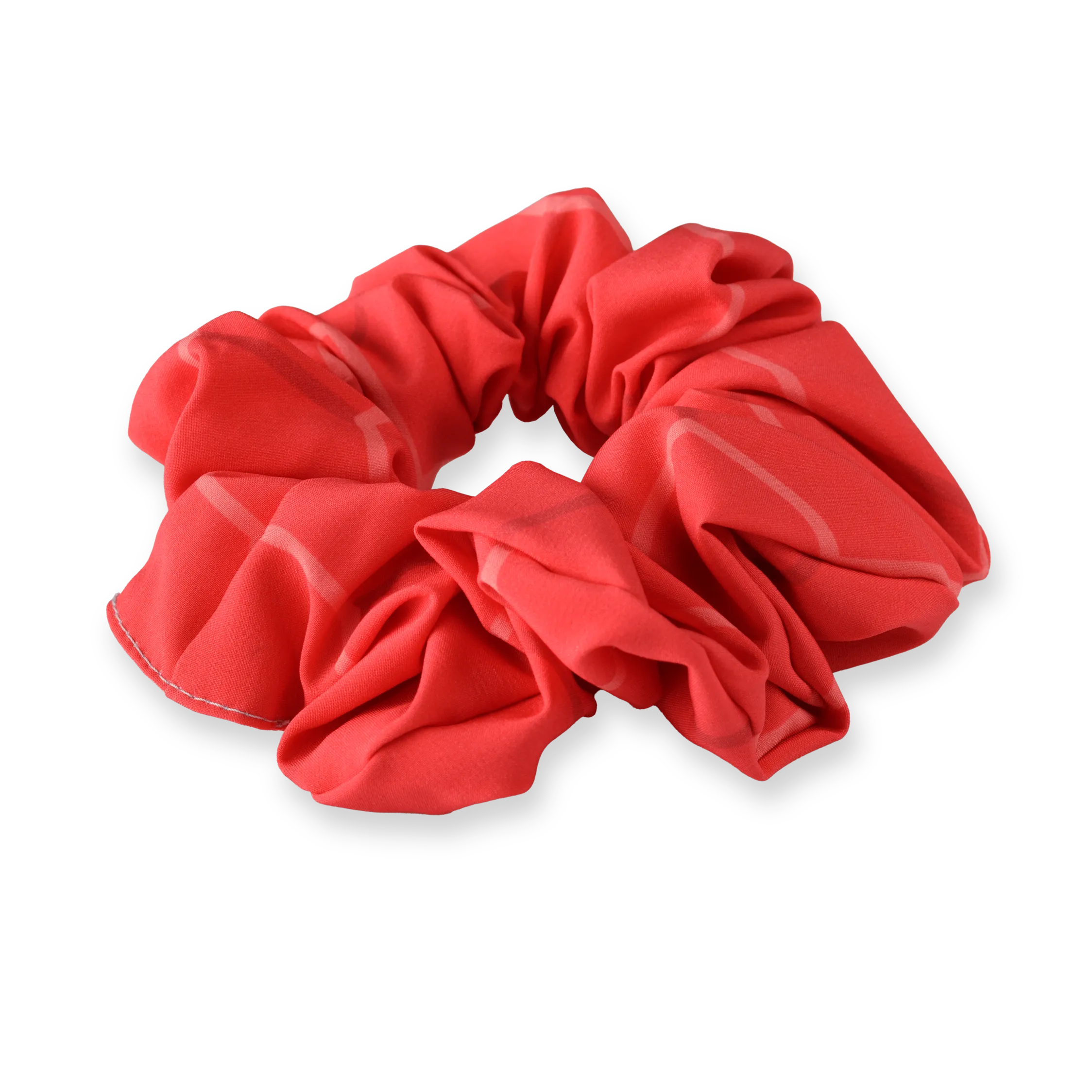 Una coleta roja hecha de material suave con un diseño casual.